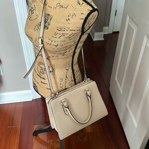 Kate Spade crossbow bag.